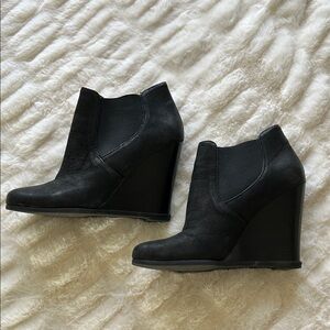 Black wedge booties